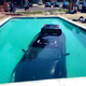 An Infiniti G37xS gets a nice deep clean at the bottom of a pool.